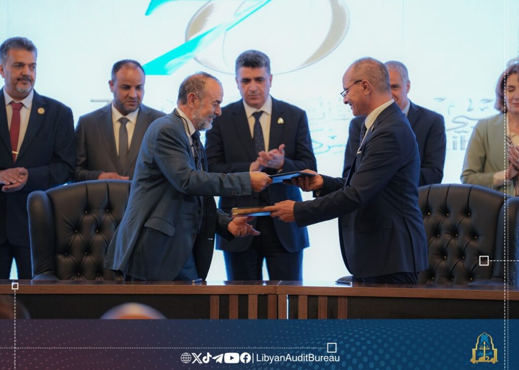 The Libyan Audit Bureau's Chairman Khaled Shakshak, center, with officials from UNDP and GIZ during the signing of the two MoOs in Tripoli, 24 September 2025. (LAB photo)