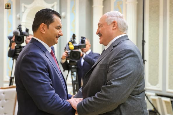 Deputy Commander of the Libyan National Army Lieutenant General Saddam Haftar, Left, is welcomed by Belarusian President Alexander Lukashenko in Minsk, Tuesday 21 October 2025. (LNA photo)