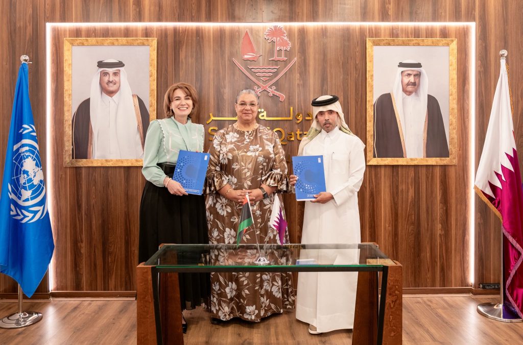 SRSG Hanna Tetteh, center, is seen her with Khaled Al Dosari, Ambassador of the State of Qatar, and Sophie Kemkhadze, UNDP Resident Representative in Libya, after signing a questionable funding agreement related to a 'Libyan-led, Libyan-owned' political dialogue. 17 November 2025. (UNSMIL photo)